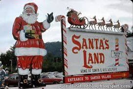 Vintage park entrance sign with Santa statue