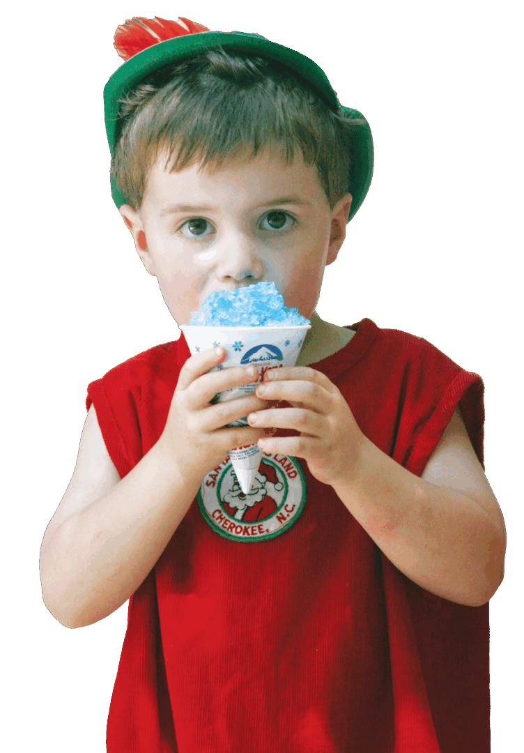 A young boy enjoying a blue ice cream cone.