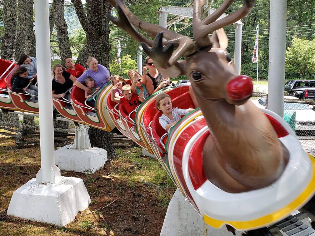Children laughing aboard holiday train